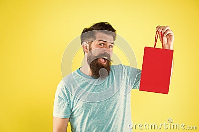Best offer. Man with gift package. Buy product. little pleasantness. bearded man go shopping. mall for men. mature male Stock Photo