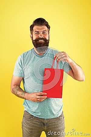 Best offer. Man with package. cyber monday concept. little pleasantness. bearded man go shopping. store for men. mature Stock Photo