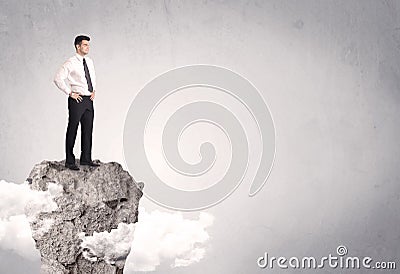 Best salesman on cliff in clear space Stock Photo