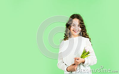 Best wishes. Happy womens day. Celebrate childrens day. Gift for mothers day concept. Little girl tulips flowers. Happy Stock Photo