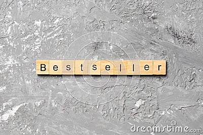 Bestseller word written on wood block. bestseller text on table, concept Stock Photo