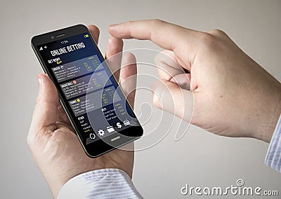 Bet online touchscreen smartphone Stock Photo