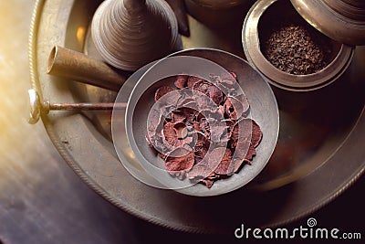 Betel nut in brass bowl, receptacle for betel nut and betel Stock Photo