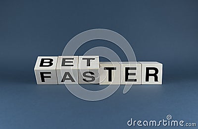 Better or Faster. Dice form the words Better or Faster Stock Photo