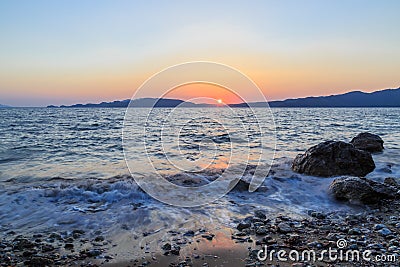 Beuatiful waves of mediterranean sea during sunset near hisaronu, marmaris Stock Photo