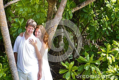 Beutiful couple in a tropical jungle Stock Photo