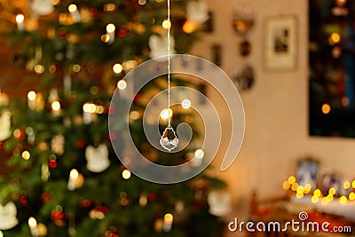 Christmassy Illuminated Interior with Christmas Tree - Bokeh Closeup Stock Photo