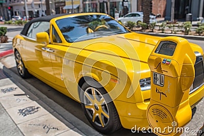 Yellow Rolls Royce Parked in Rodeo Drive in Beverly Hills Editorial Stock Photo