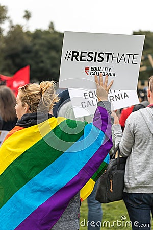 Resist Hate sign and the Rainbow Flag Editorial Stock Photo