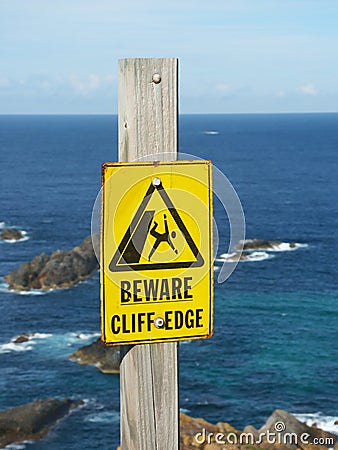 Beware of Cliff Edge Sign Stock Photo