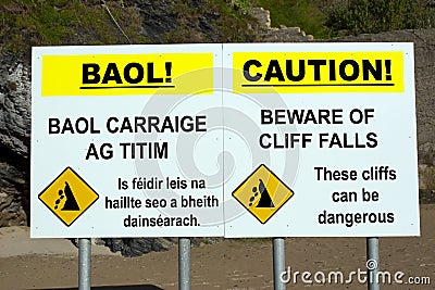 Beware of cliff falls warning sign Stock Photo