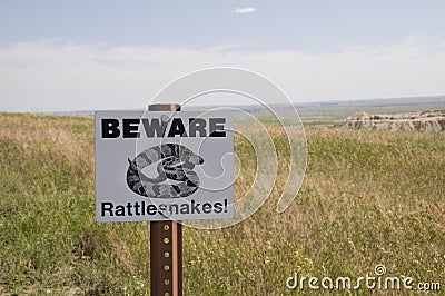 Beware rattlesnakes sign Stock Photo