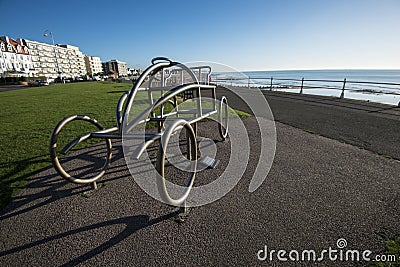 The metal sculpture of an early car commemorates the world`s first motor race at Bexhill-on-Sea in East Sussex, England Editorial Stock Photo