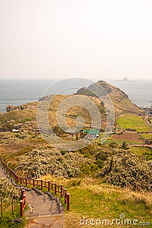 Beyond the sea Mountain. jeju Sanbangsan in south korea. Stock Photo