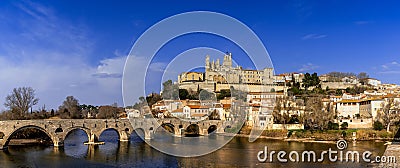 panorama view of the historic old town center of Beziers with Saint Nazaire Church and Roman bridge over the river Orb Editorial Stock Photo