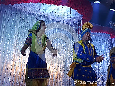 Bhangra Dancers performing on stage Editorial Stock Photo