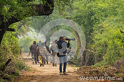 Bharatpur, Rajasthan / India - 14 December 2019 : nature lovers, bird photographers in search of migratory birds at keoladeo park Editorial Stock Photo