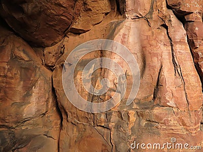 Bhimbetka rock shelter with petroglyphs of domesticated ? animals on cave wall, Madhya Pradesh, India Editorial Stock Photo