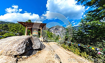 Bhutan, October 26, 2021: Buddhistic prayer drum in the mountains of Buthan, near the Tiger nest monastery in the Himalaya Editorial Stock Photo