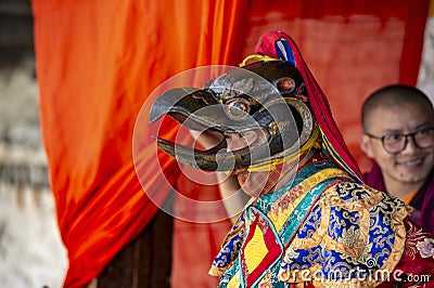 Bhutanese Cham masked dance, Buddhist lama dance, dancers behind the curtain and waiting for the play , Bumthang, central Bhutan. Editorial Stock Photo