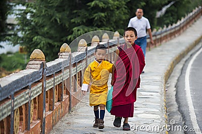 Bhutanese young brothers , two boys in traditional clothes , Bhutan Editorial Stock Photo