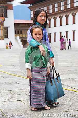 Bhutanese young girls in traditional clothes , Bhutan Editorial Stock Photo
