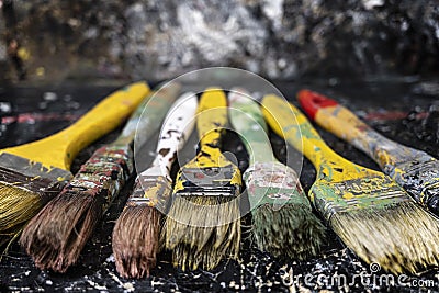 Big and dirty artist paint brushes Stock Photo