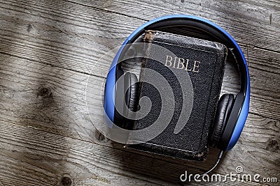 Bible and headphones Stock Photo