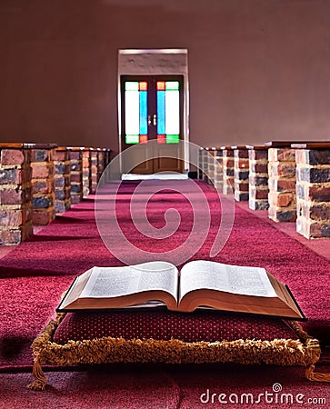 Bible lying on a pillow Stock Photo