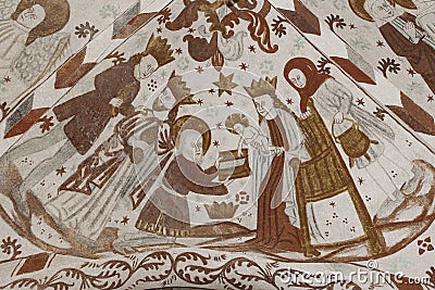 Biblical Magi bringing their gifts to the christchild, an ancient fresco Editorial Stock Photo