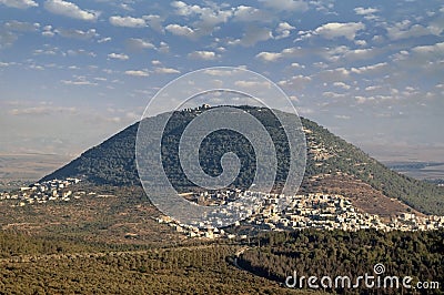 Biblical Mount Tabor and the Arab village Stock Photo