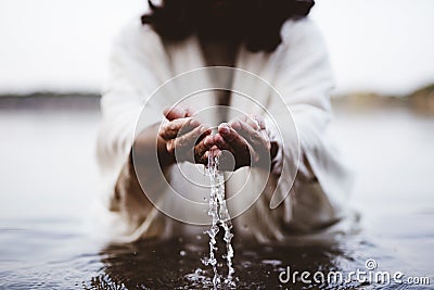 Biblical scene - of Jesus Christ drinking water with his hands Stock Photo
