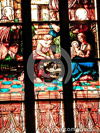 Biblical scenes on stained glass. Arch-see in Frombork Editorial Stock Photo