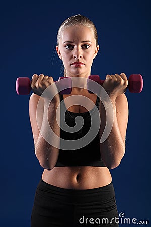 Bicep curl anaerobic exercise young fitness woman Stock Photo