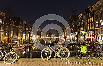 Bicycle on a bridge in Amsterdam Editorial Stock Photo