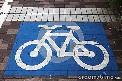 Bicycle crossing painted in blue and white Stock Photo