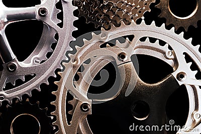 Bicycle gears on black background Stock Photo