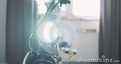 bicycle headlight shines into the camera. Bicycle steering wheel turns left to right. The concept of setting up a bike Stock Photo