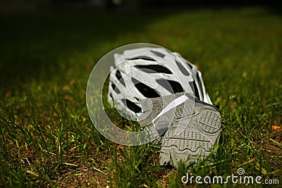 Bicycle helmet on grass Stock Photo