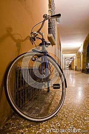 Bicycle leaning against the wall Stock Photo