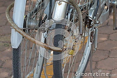 Bicycle locked together in the park Stock Photo