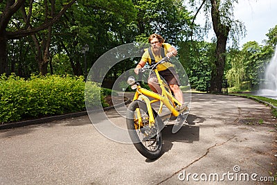 Bicycle messenger with cargo bike speeding Stock Photo
