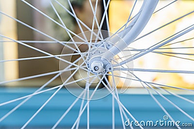 Bicycle painted white standing on the street Stock Photo