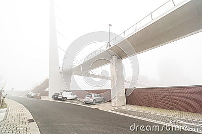 Bicycle pedestrian bridge with fog Stock Photo