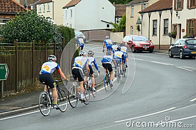 Bicycle riders training on town road Editorial Stock Photo