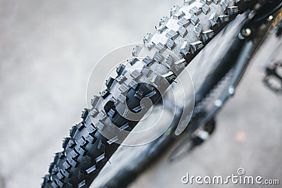 Bicycle rubber before and after cleaning. Tire care concept. Stock Photo