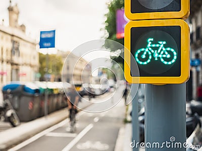 Bicycle Sign Traffic Light City Street People riding on Bike lane Ecology lifestyle Transportation Stock Photo