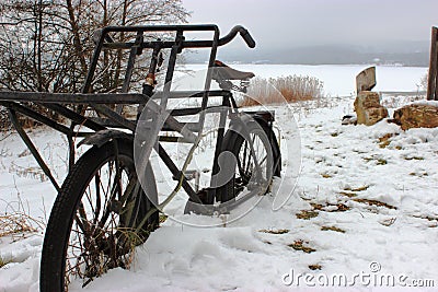Bicycle in the snow Stock Photo