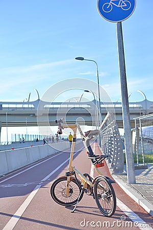 Bicycle Strida on bike path. Editorial Stock Photo