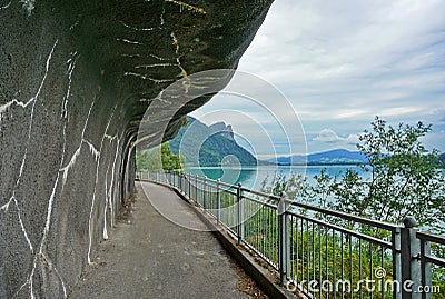 Bicycle trail under a rock overhang Stock Photo